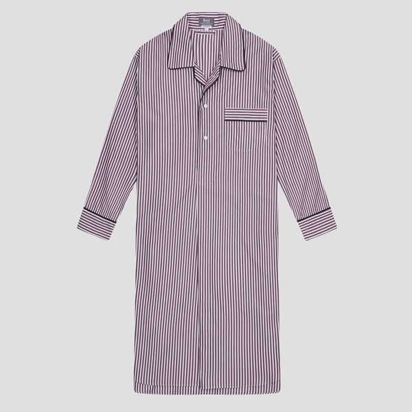 A long-sleeve button-front nightshirt or pajama shirt with vertical purple and white stripes, featuring a pointed collar, button placket, and a chest pocket with striped piping, shown on a light gray background.