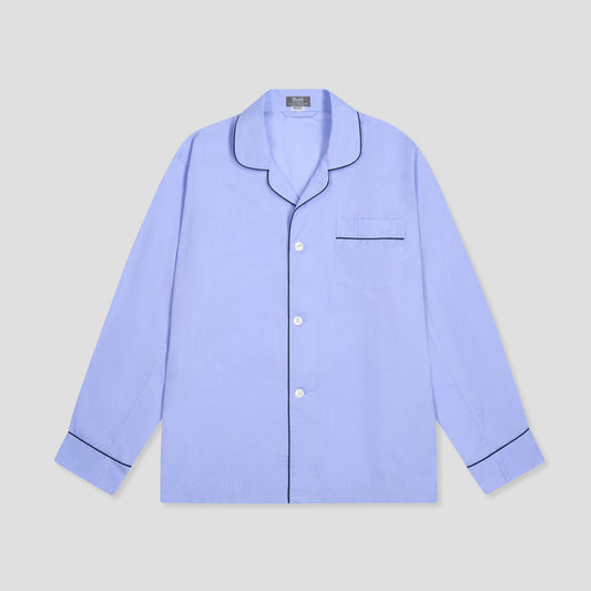 Light blue pajama shirt on a light gray background