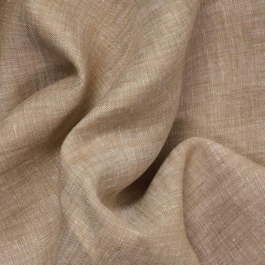Close-up of beige fabric with a subtle texture