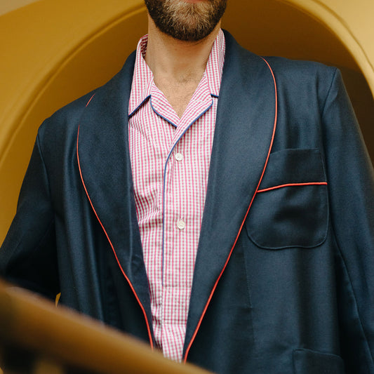 Close up of Model wearing Men's Gingham Cotton Poplin Nightshirt in Red with blue and red dressing gown
