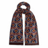 Fine wool scarf with abstract design in brown, blue and tan.