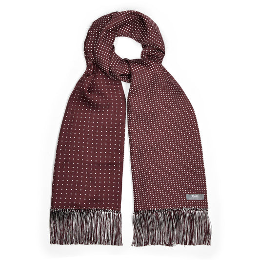 Burgundy double sided spot silk scarf with smaller dots on rear and hand tassels