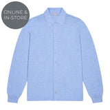 Light blue button-up shirt on a white background with 'Online & In-Store' text.