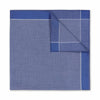 Folded blue fabric with a grid pattern on a white background