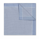 Folded blue checkered fabric on a white background