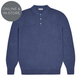 Blue sweater with a collar on a white background with tag reading online and in-store