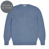 Blue sweater on a white background with 'Online & In-Store' text.