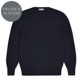 Black sweater on a white background with 'Online & In-Store' text.