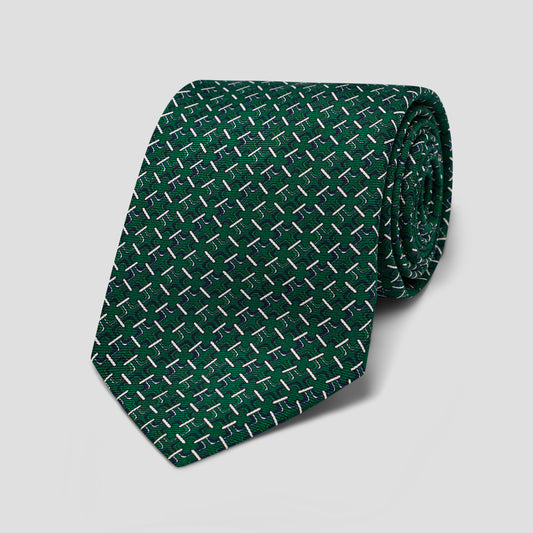 Hand-made emerald silk tie featuring a white Art Deco geometric trellis print and a classic 8.5cm blade width.