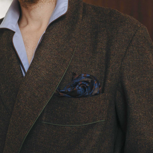 Male model detail shot lwearing brown dressing gown with pocket square