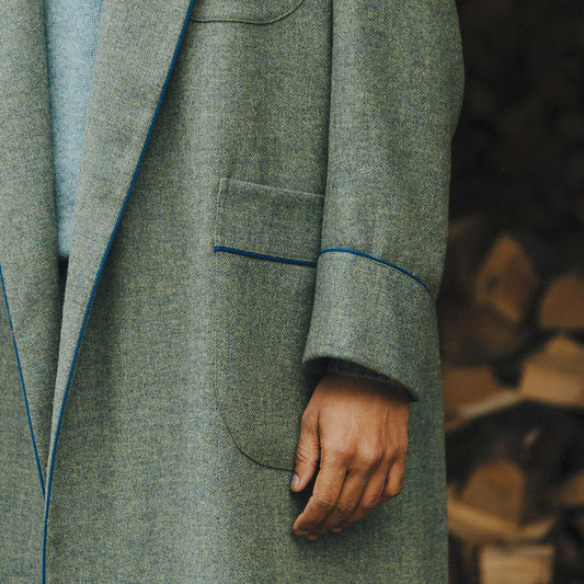 Male model detail shot of tweed dressing gown in green 
