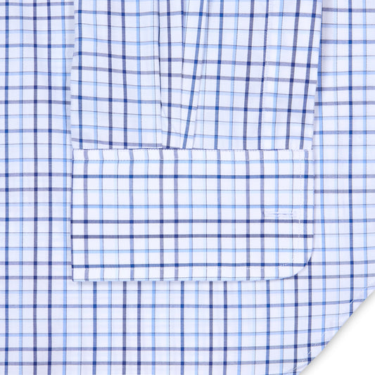 Close-up of a blue and white checkered fabric with a pocket detail.