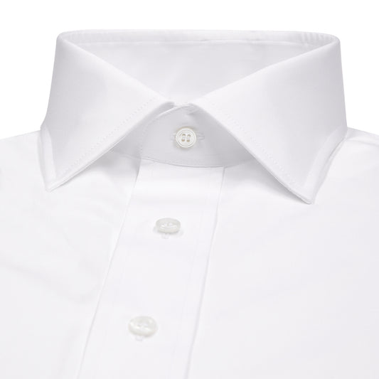 Close-up of a white dress shirt with a collar and buttons on a white background