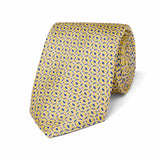 Yellow tie with blue pattern on a white background