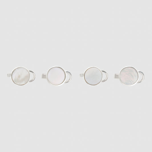 Four oval stud earrings with iridescent white mother-of-pearl centers and silver-toned settings, arranged in a row against a light gray background.