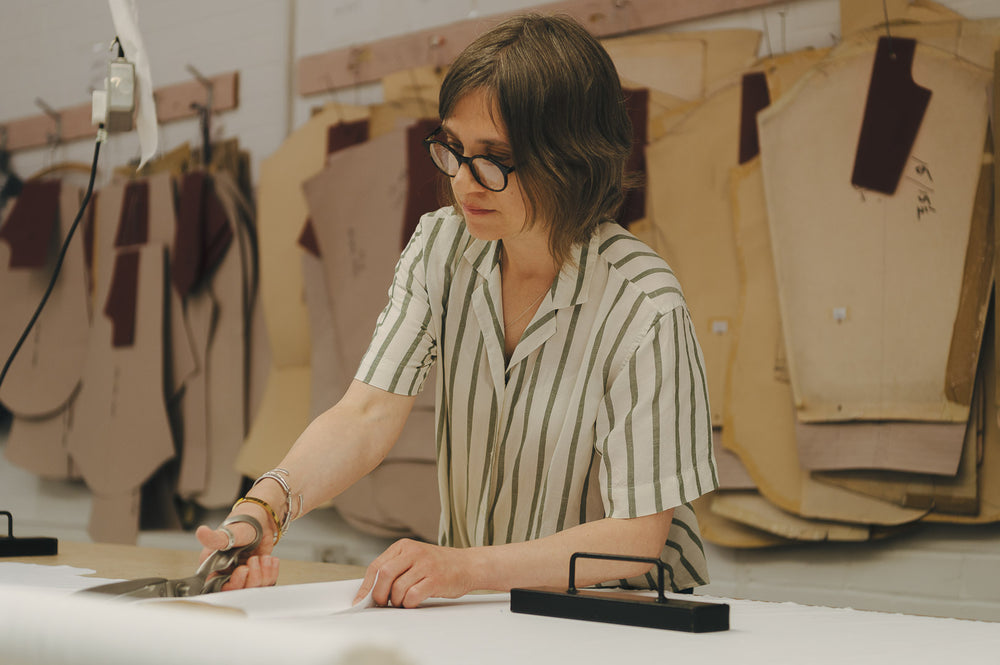 Person working with fabric in a clothing workshop