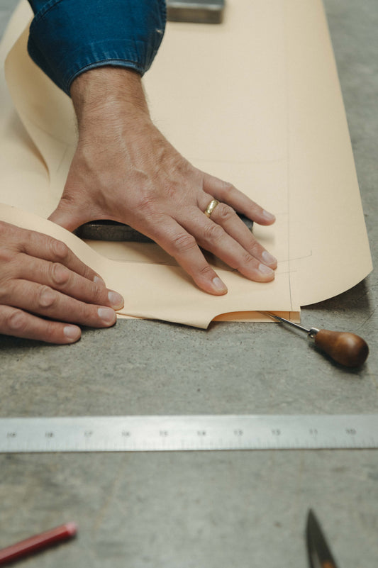 Cutting room with shirt cutting tools and measuring