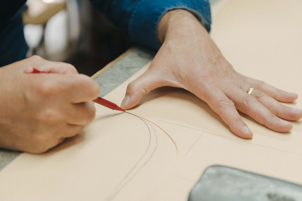 Bespoke pattern being drawn on brown paper