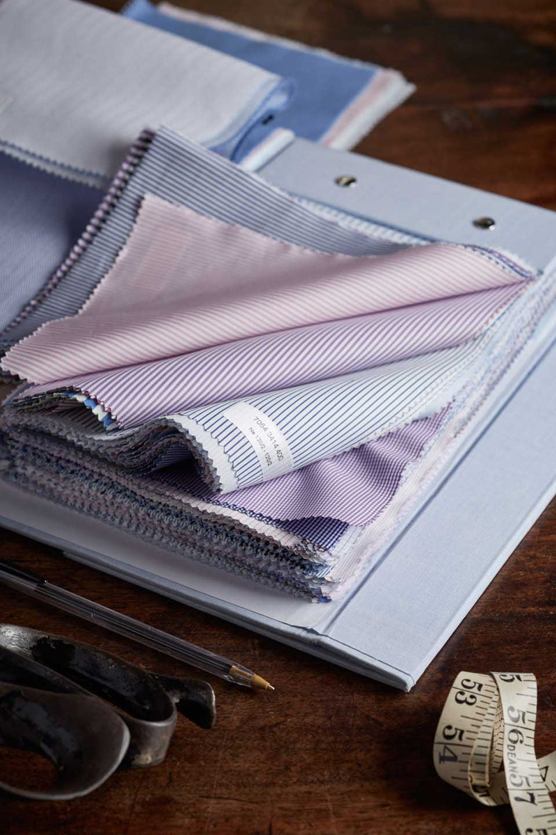 Bespoke shirt cutting book of cloth swatches