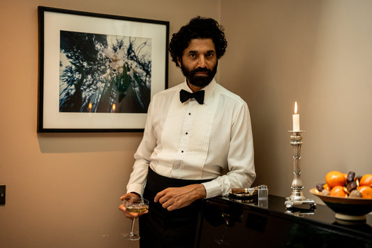 Model wearing cream spun silk Kirby Allison x Budd  1/4 hand-pleated evening dress shirt 