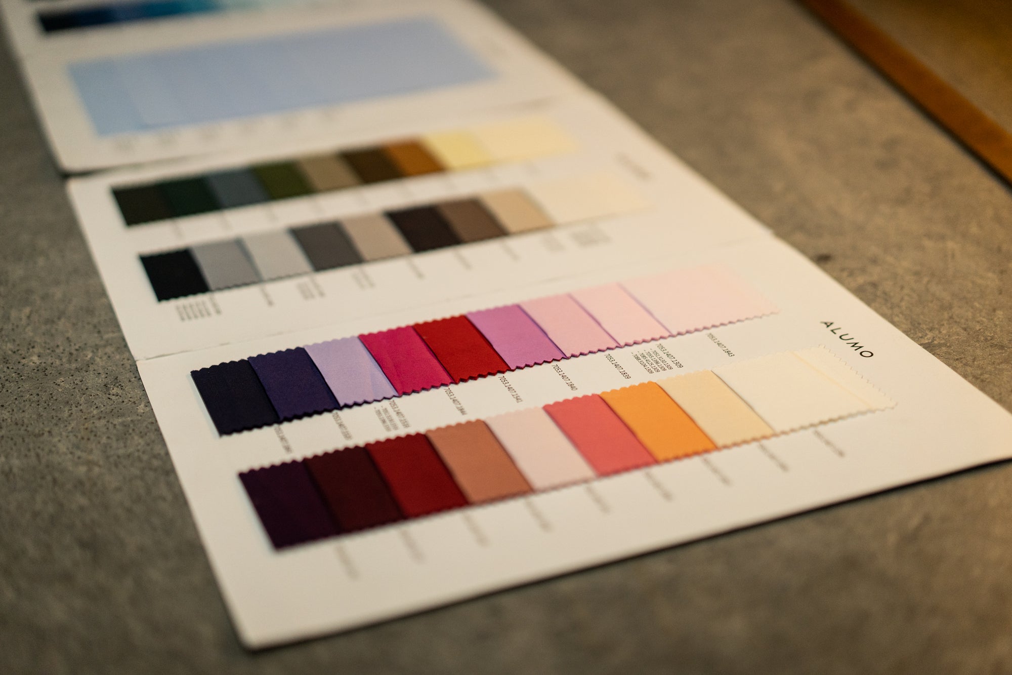 Color swatch chart on a textured surface
