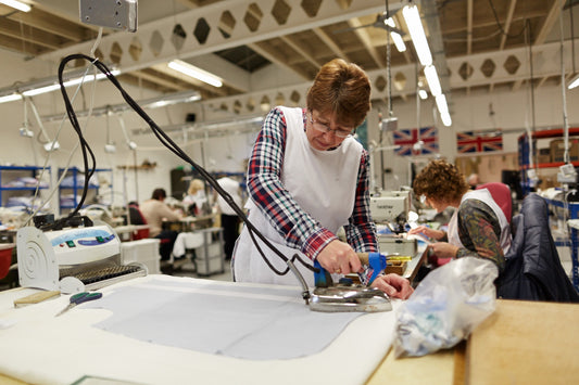 Budd Shirtmakers - pressing a shirt at Andover workroom
