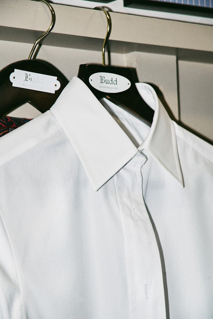 Close up detail of white shirt and collar