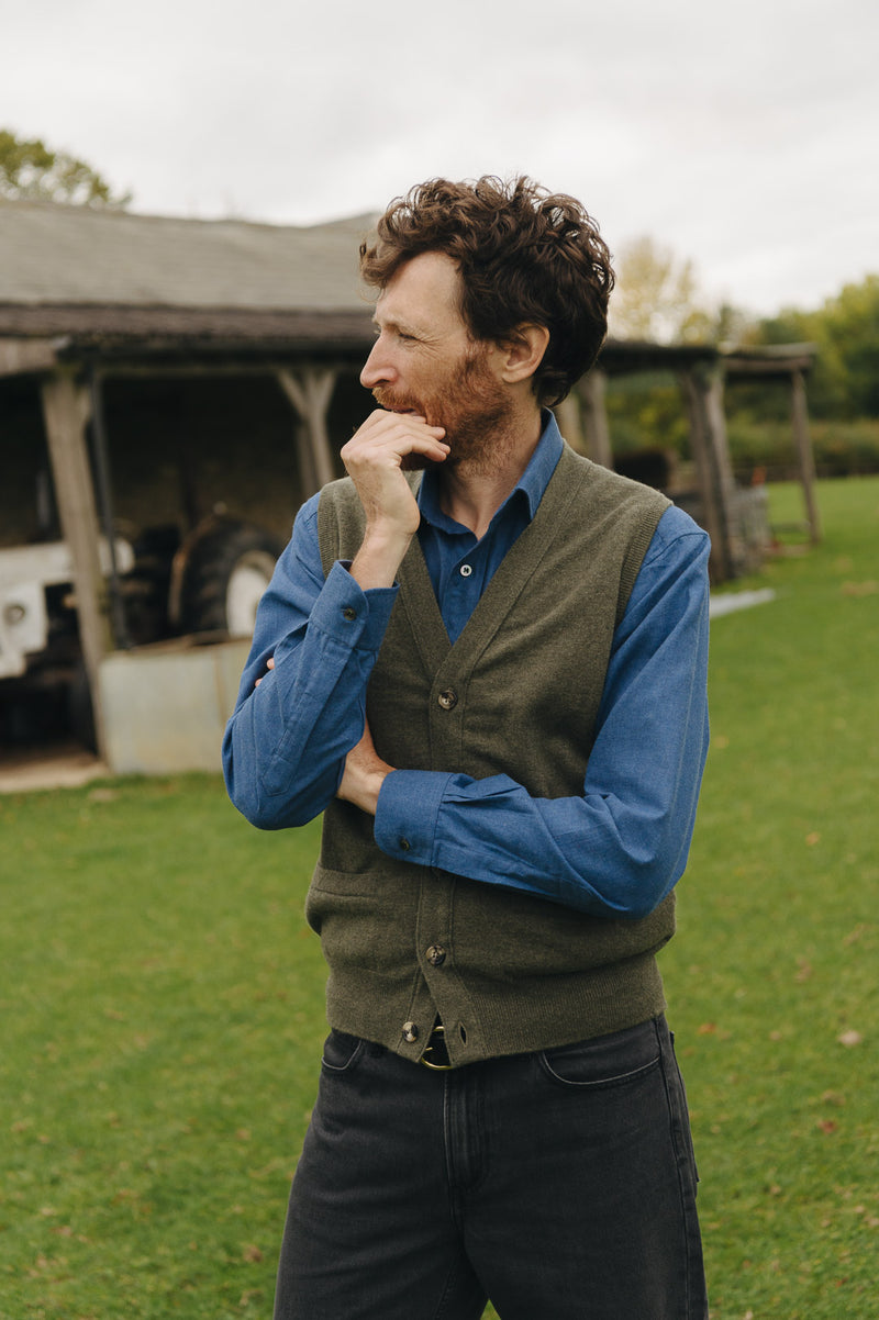 Man stood outside wering Green Knitted Slipover Knitwear 