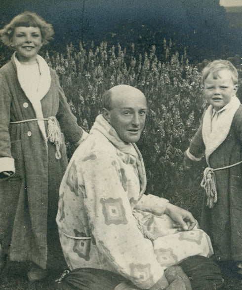 Budd shirtmakers old black and white photo of the founder in the garden with his two children