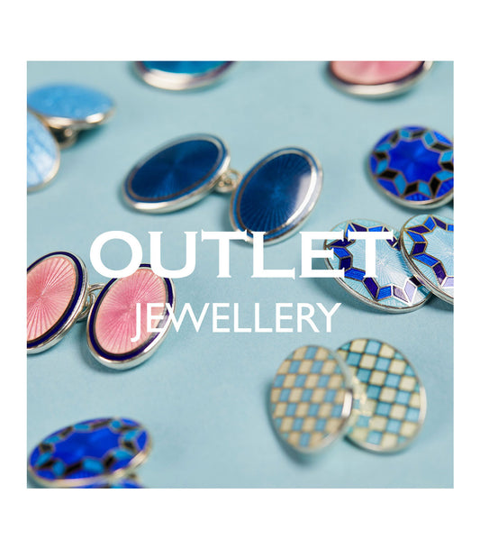 Selection of cufflinks laid on blue background with Outlet Jewellery written across