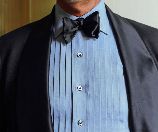 Close up of pleated bib washed denim dress shirt by WM Brown and Budd