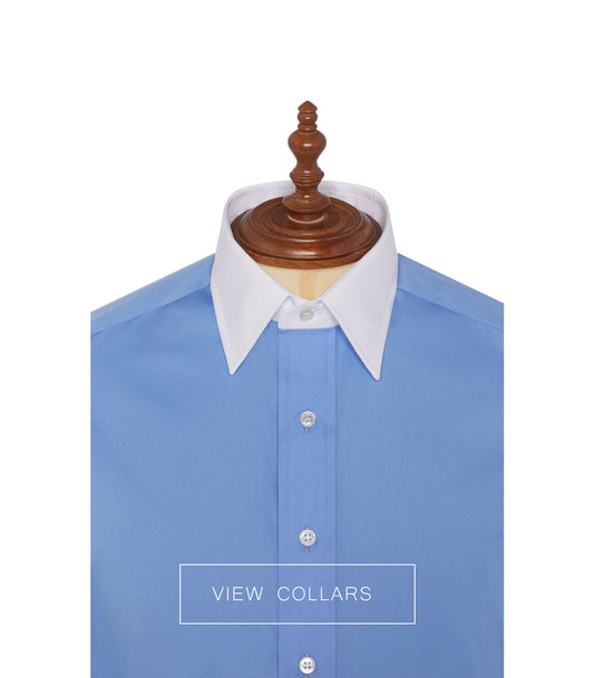 Product shot of blue shirt on mannequin with white collar