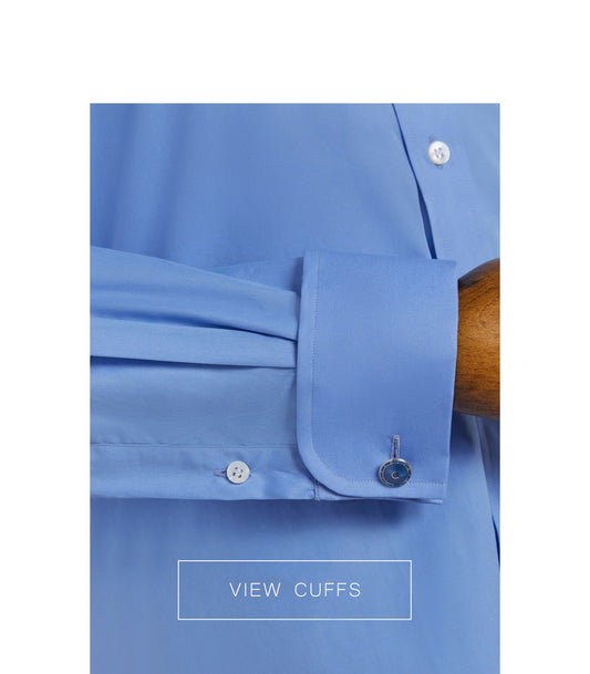 Product shot of blue shirt on mannequin with close up of cuff option