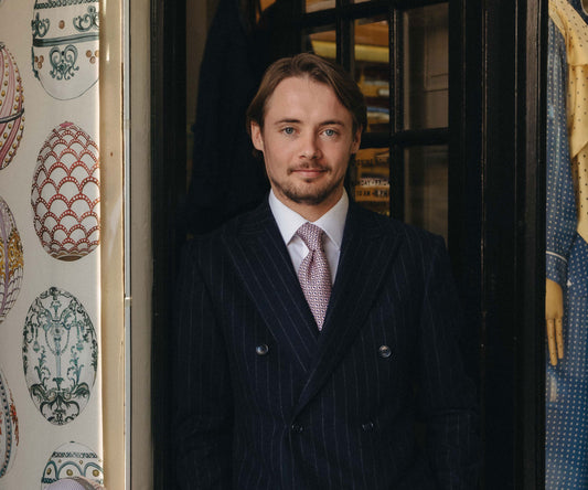 Sales Advisor Tom in doorway of Budd Shirtmakers shop