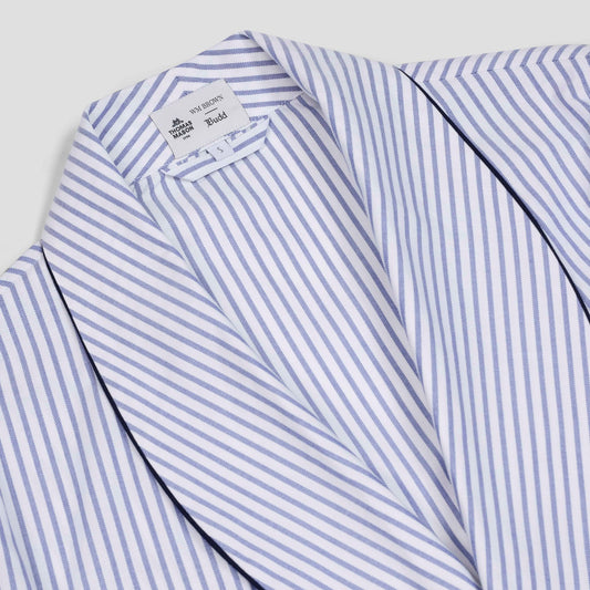 Close-up of a Oxford cotton dressing gown in white with blue vertical stripes.
