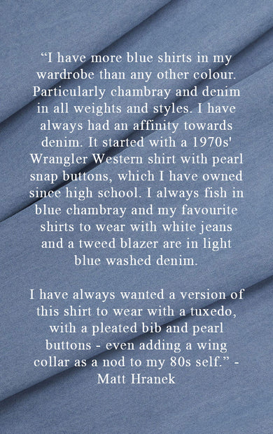 Collaboration quote in white font written on cloth swatch of washed denim fabric 