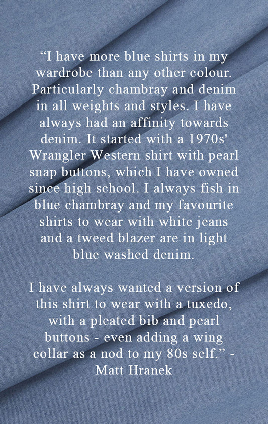 Collaboration quote in white font written on cloth swatch of washed denim fabric 