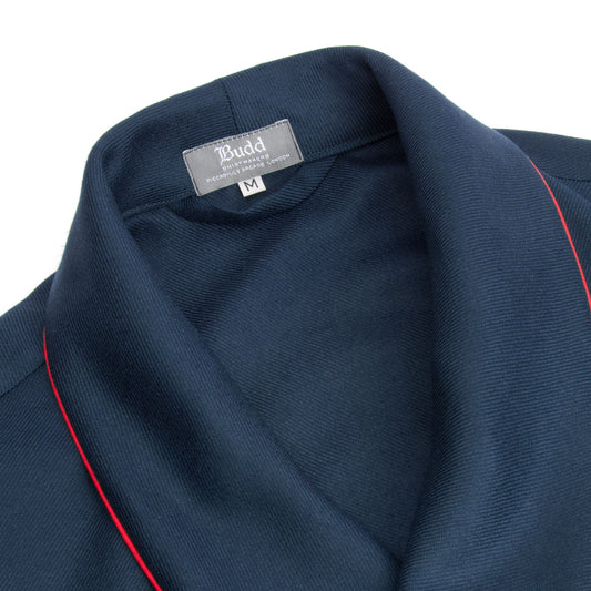 Collar detail on navy wool dressing gown with red hand-piping