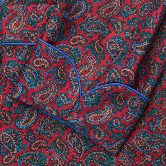 Hand-piped sleeve detail of red and blue authentic madder silk paisley dressing gown 