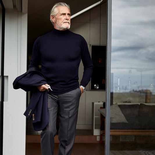 Model wearing Plain Wool Turtle Neck Jumper in Black