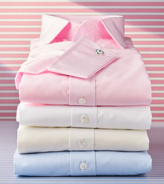 Stack of Budd Sea Island cotton shirts