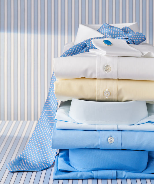 Stack of Swiss poplin shirts 