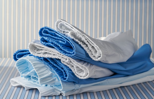 Stack of cotton poplin boxer shorts in blue and white
