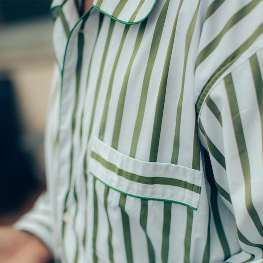 Detail of WM Brown x Budd stripe nightshirt in white and olive green